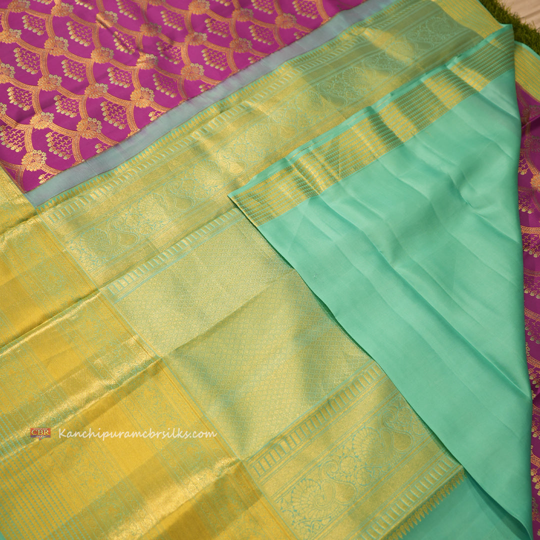 KANCHI MAGENTA WITH MEENAKARI SAREE